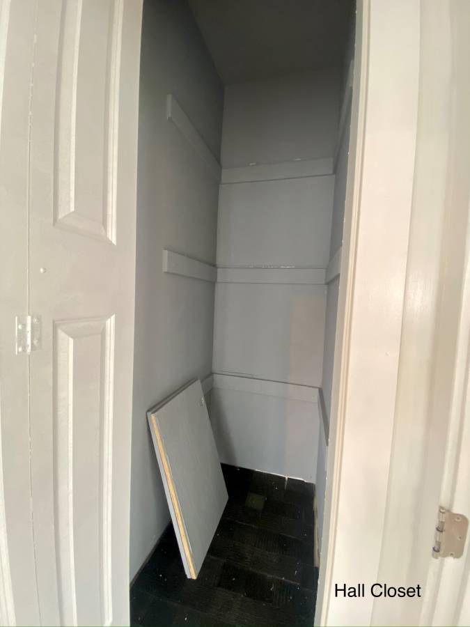 Hall closet — dropped shelf